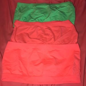 strapless bras. in neon green and pink.